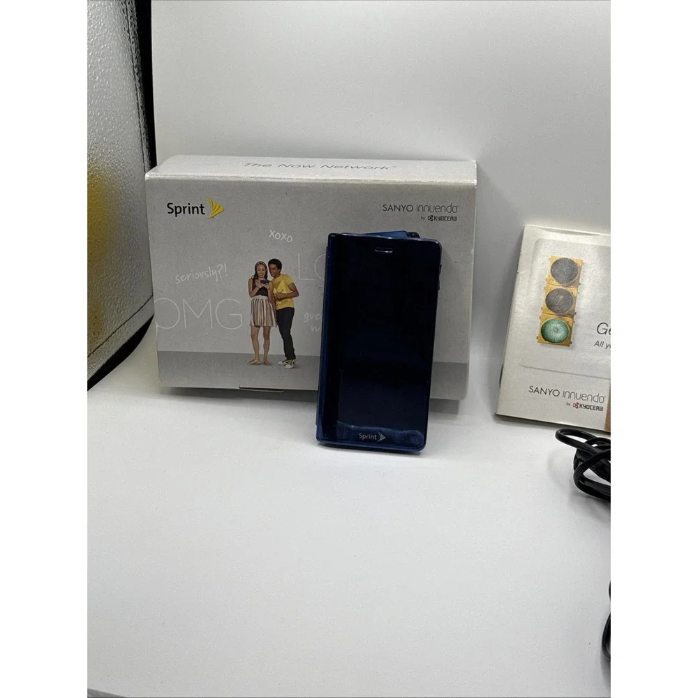 Sanyo Innuendo SCP-6780 Sprint Blue Kyocera Has Ink Spot Works Has Power Manual